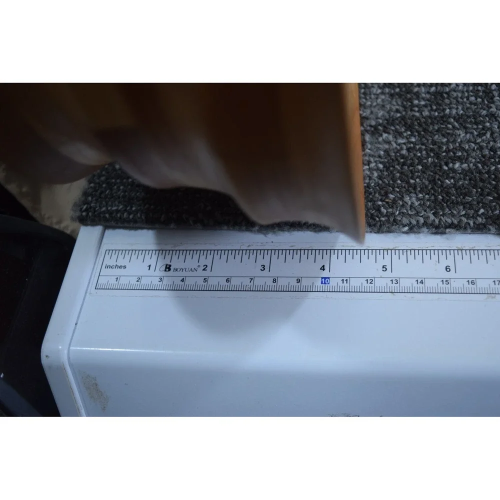 Laurin G Vance stands handmade measures